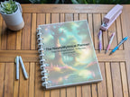 NeuroMythical ADHD-friendly Printable Planner on a wooden surface with a cup, pens, and highlighters
