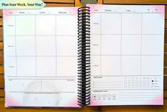 Open NeuroMythical Planner showing the weekly spread with sections for morning, afternoon, and evening planning, a Top 3 priorities area, habit tracker, and weekly mood tracker.