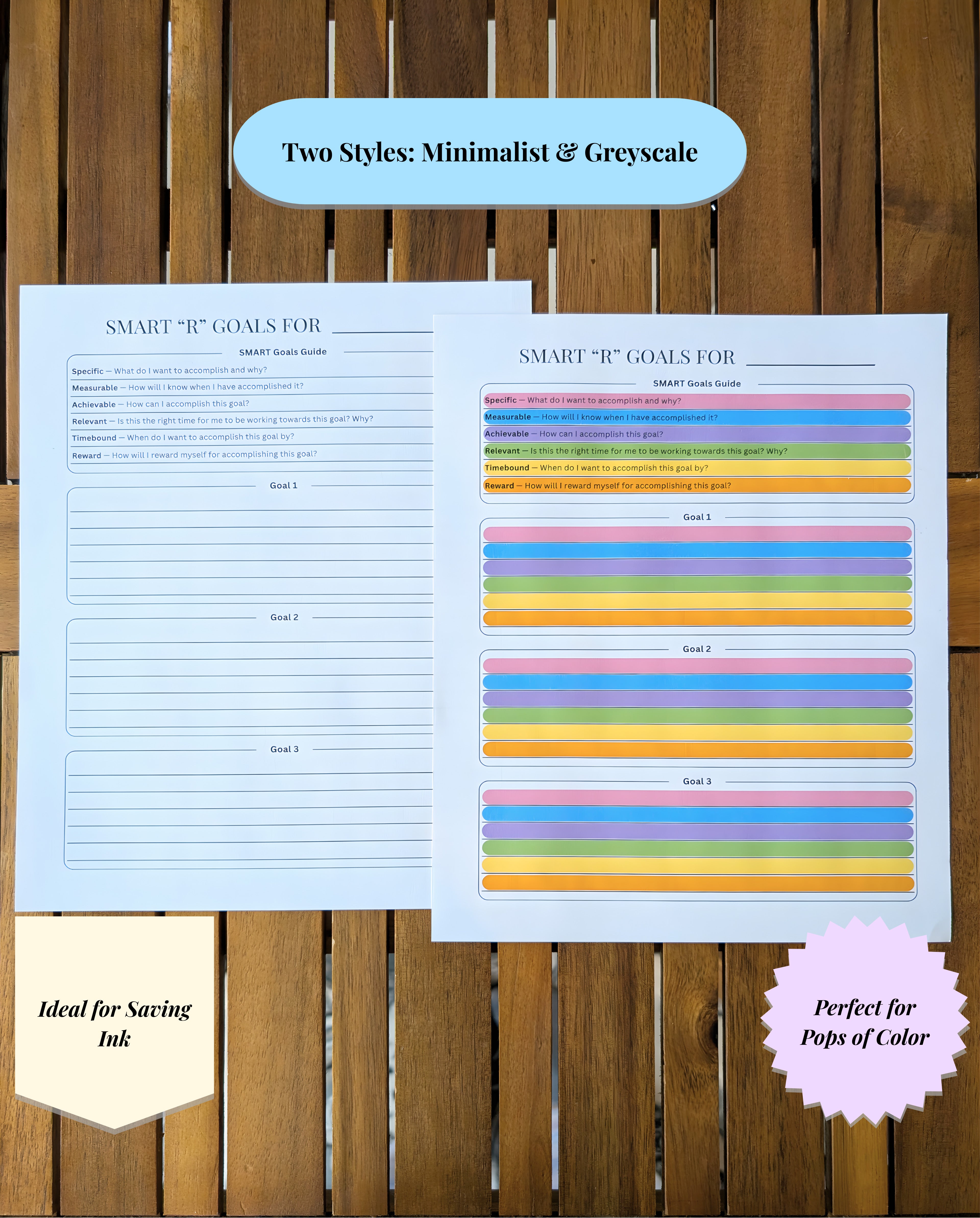 Two goal-setting sheets, one greyscale and one with colorful stripes, on a wooden surface.